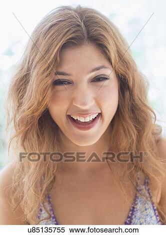 Portrait of young woman laughing View Large Photo Image Stock Photography - Portrait of young woman laughing. Fotosearch