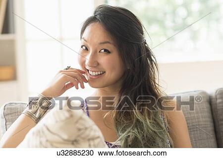 Portrait of young woman smiling View Large Photo Image Stock Image - Portrait of young woman smiling. Fotosearch
