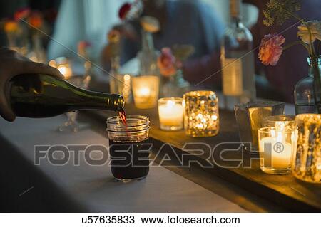 Pouring wine View Large Photo Image Stock Image - Pouring wine. Fotosearch