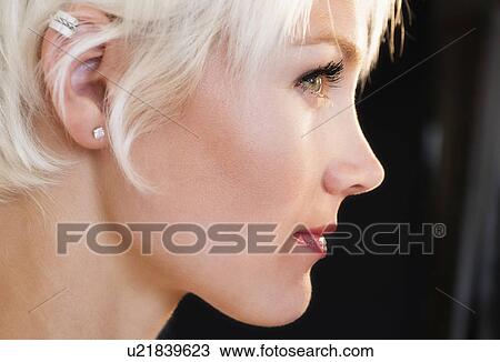 Stock Image - Profile of blonde woman. Fotosearch