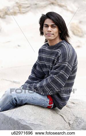 Queens, Portrait of young man View Large Photo Image Stock Photograph - Queens, Portrait of young man. Fotosearch