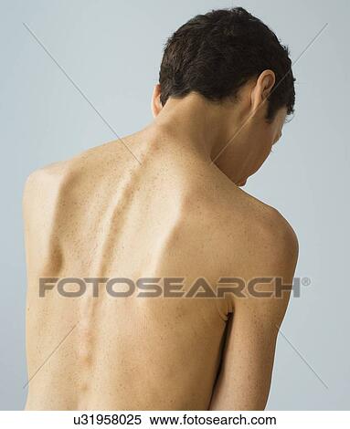 Rear view of shirtless senior woman View Large Photo Image Stock Photography - Rear view of shirtless senior woman. Fotosearch