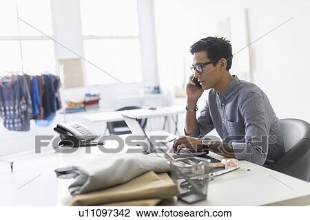 Side view of man working in studio View Large Photo Image Stock Image - Side view of man working in studio. Fotosearch