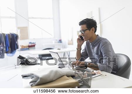 Side view of man working in studio View Large Photo Image Stock Photograph - Side view of man working in studio. Fotosearch