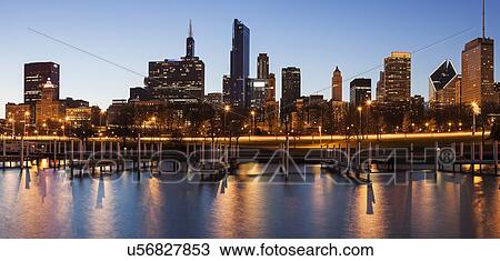 Skyline at dusk seen from marina View Large Photo Image Stock Image - Skyline at dusk seen from marina. Fotosearch