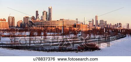 Soldier Field and city skyline at sunrise View Large Photo Image Stock Photograph - Soldier Field and city skyline at sunrise . Fotosearch
