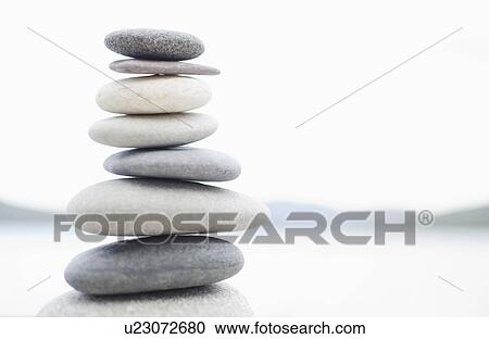 Stacked pebbles View Large Photo Image Stock Image - Stacked pebbles. Fotosearch
