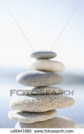 Stacked pebbles View Large Photo Image Stock Photography - Stacked pebbles. Fotosearch
