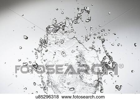 Stock Photo - Studio shot of droplets on the move. Fotosearch
