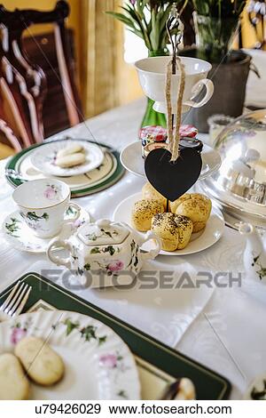 Tea party setting in the dining room View Large Photo Image Stock Photo - Tea party setting in the dining room. Fotosearch