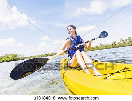 Woman kayaking View Large Photo Image Stock Photo - Woman kayaking. Fotosearch