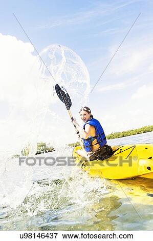 Woman kayaking View Large Photo Image Stock Photo - Woman kayaking. Fotosearch