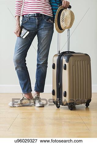 Woman ready to go on vacations View Large Photo Image Stock Photo - Woman ready to go on vacations. Fotosearch