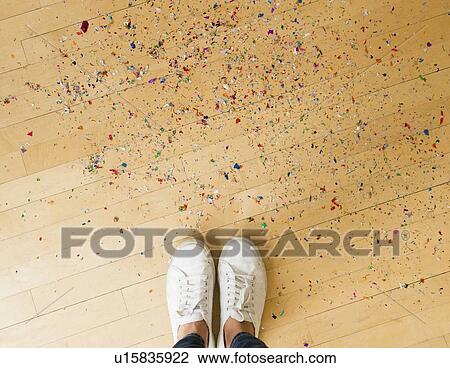 Woman's feet and confetti on floor View Large Photo Image Stock Image - Woman's feet and confetti on floor. Fotosearch