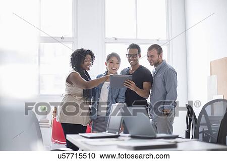 Women and men working in office View Large Photo Image Stock Image - Women and men working in office. Fotosearch