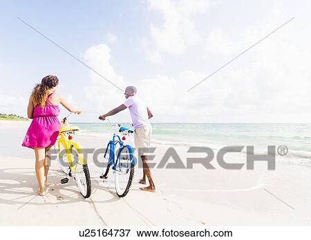 Young couple during bike trip View Large Photo Image Stock Photo - Young couple during bike trip. Fotosearch