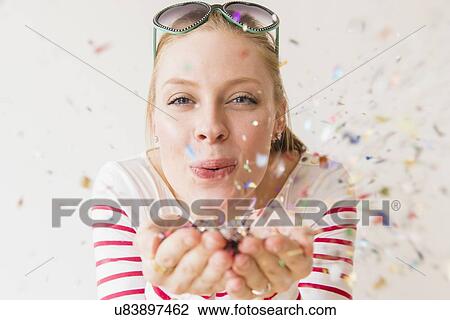 Young woman having party View Large Photo Image Stock Image - Young woman having party. Fotosearch