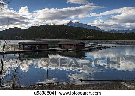 Lake Minnewanka reflections View Large Photo Image Stock Image - Lake Minnewanka reflections. Fotosearch