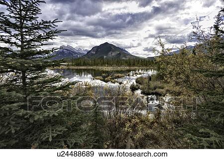 Stock Photo - Mount Rundle via Vermilion Lakes. Fotosearch
