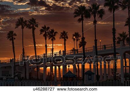 Stock Photo - Oceanside pier at sunset. Fotosearch