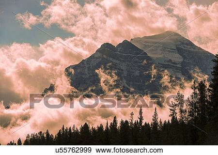 Stock Photo - Ten Peaks surrounded by pink clouds. Fotosearch