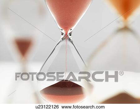 Stock Photograph - A variety of hour glass timers in use. Fotosearch