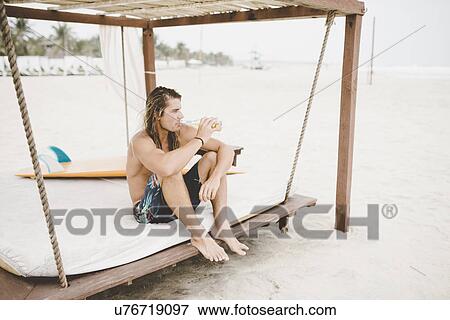 Australian surfer on makeshift bed, Bacocho, Puerto Escondido, Mexico View Large Photo Image Stock Photo - Australian surfer on makeshift bed, Bacocho, Puerto Escondido, Mexico. Fotosearch