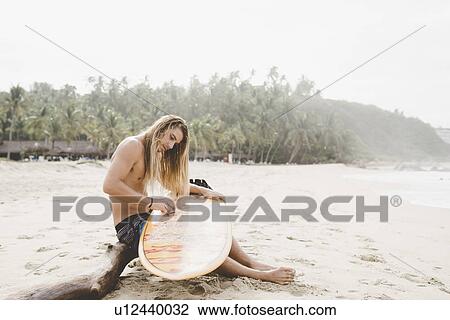 Australian surfer preparing surfboard, Bacocho, Puerto Escondido, Mexico View Large Photo Image Stock Image - Australian surfer preparing surfboard, Bacocho, Puerto Escondido, Mexico. Fotosearch