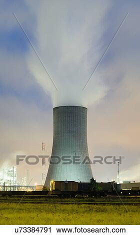 Cooling tower on a chemical plant in Antwerp harbour at night, Antwerp, Belgium View Large Photo Image Stock Image - Cooling tower on a chemical plant in Antwerp harbour at night, Antwerp, Belgium. Fotosearch
