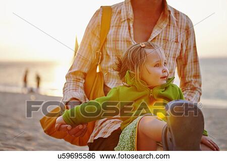 Father lifting daughter View Large Photo Image Stock Photograph - Father lifting daughter. Fotosearch