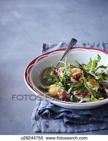 Fig, goats cheese and rocket salad View Large Photo Image Stock Photography - Fig, goats cheese and rocket salad. Fotosearch