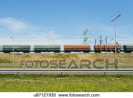 Freight train traveling through Rotterdam harbor, Netherlands View Large Photo Image Stock Photography - Freight train traveling through Rotterdam harbor, Netherlands. Fotosearch