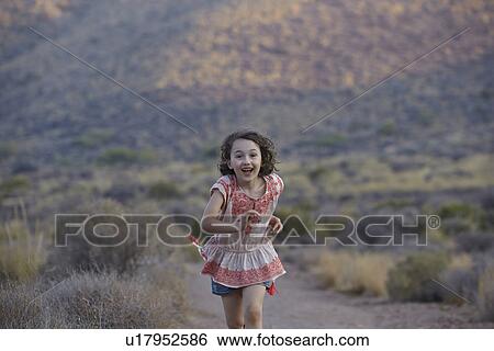 Girl running, Almeria, Andalusia, Spain View Large Photo Image Stock Photograph - Girl running, Almeria, Andalusia, Spain. Fotosearch