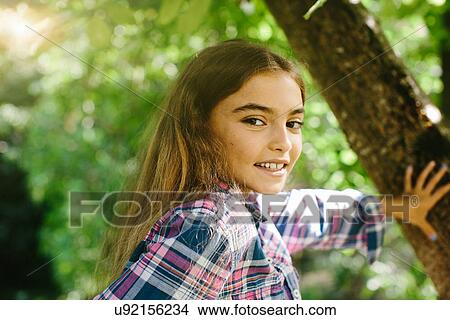 Girl with brown hair, portrait View Large Photo Image Picture - Girl with brown hair, portrait. Fotosearch