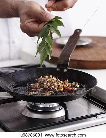 Stock Image - How to Make Curry Step 10. Fotosearch