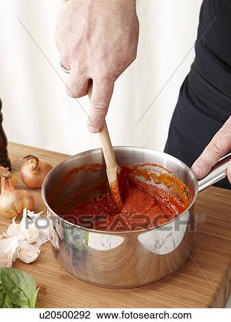 Stock Image - How to make Rolled Rare Lamb Ratatouille Step 02. Fotosearch