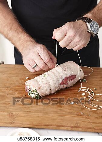 Stock Photography - How to make Rolled Rare Lamb Ratatouille Step 07. Fotosearch