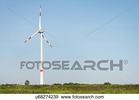Stock Photo - Landscape with wind turbine, Antwerp harbor, Antwerp, Belgium. Fotosearch