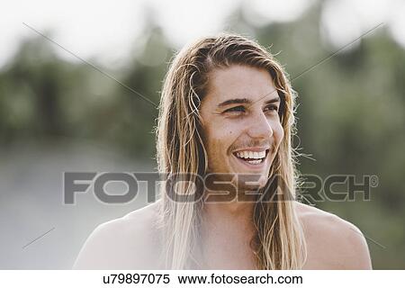 Man in long hair with wide smile View Large Photo Image Stock Photography - Man in long hair with wide smile. Fotosearch
