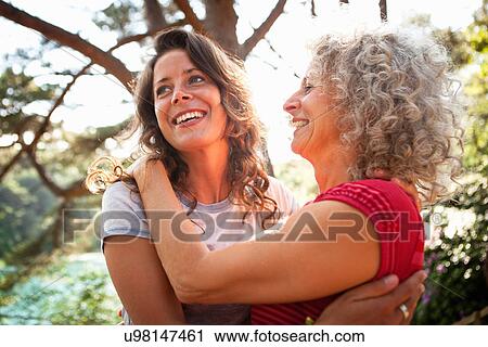 Stock Image - Mother and daughter enjoying nature. Fotosearch