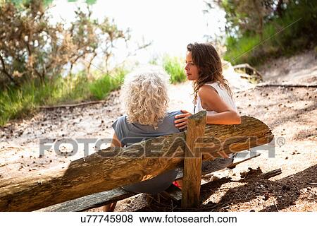 Mother and daughter enjoying nature, The Blue Pool, Wareham, Dorset, United Kingdom View Large Photo Image Stock Photo - Mother and daughter enjoying nature, The Blue Pool, Wareham, Dorset, United Kingdom. Fotosearch