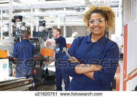 Portrait of female student in workshop at college View Large Photo Image Stock Image - Portrait of female student in workshop at college. Fotosearch