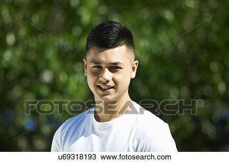 Portrait of male teenage student outside college View Large Photo Image Stock Image - Portrait of male teenage student outside college. Fotosearch