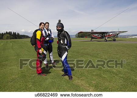 Portrait of skydiving team preparing to fly, Buttwil, Luzern, Switzerland View Large Photo Image Stock Photo - Portrait of skydiving team preparing to fly, Buttwil, Luzern, Switzerland. Fotosearch