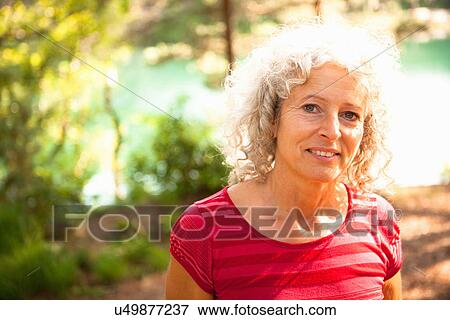 Portrait of woman, The Blue Pool, Wareham, Dorset, United Kingdom View Large Photo Image Stock Photo - Portrait of woman, The Blue Pool, Wareham, Dorset, United Kingdom. Fotosearch