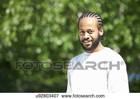Portrait of young male student View Large Photo Image Stock Photo - Portrait of young male student. Fotosearch