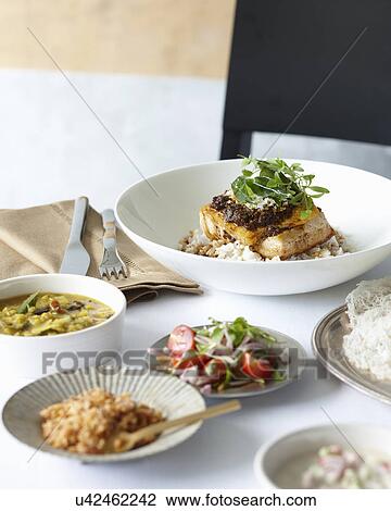 Sri Lankan fish curry meal View Large Photo Image Stock Image - Sri Lankan fish curry meal. Fotosearch