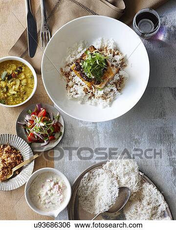Sri Lankan fish curry meal View Large Photo Image Stock Photograph - Sri Lankan fish curry meal. Fotosearch