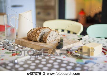 Traditional table set for breakfast with bread and butter View Large Photo Image Stock Image - Traditional table set for breakfast with bread and butter. Fotosearch