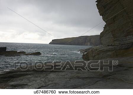 View of cliffs and sea, Treknow, Cornwall, UK View Large Photo Image Stock Image - View of cliffs and sea, Treknow, Cornwall, UK. Fotosearch